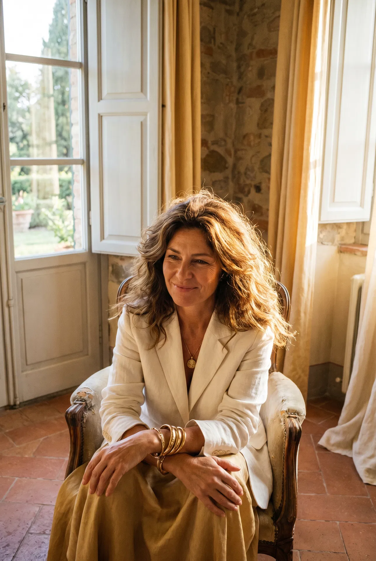 Doublure — Hair Topper model, warm brown hair with golden highlights in Tuscan villa